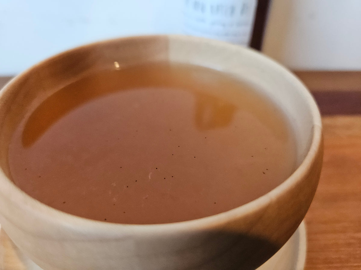 Better Brew served as an amber drink in a ceramic cup.